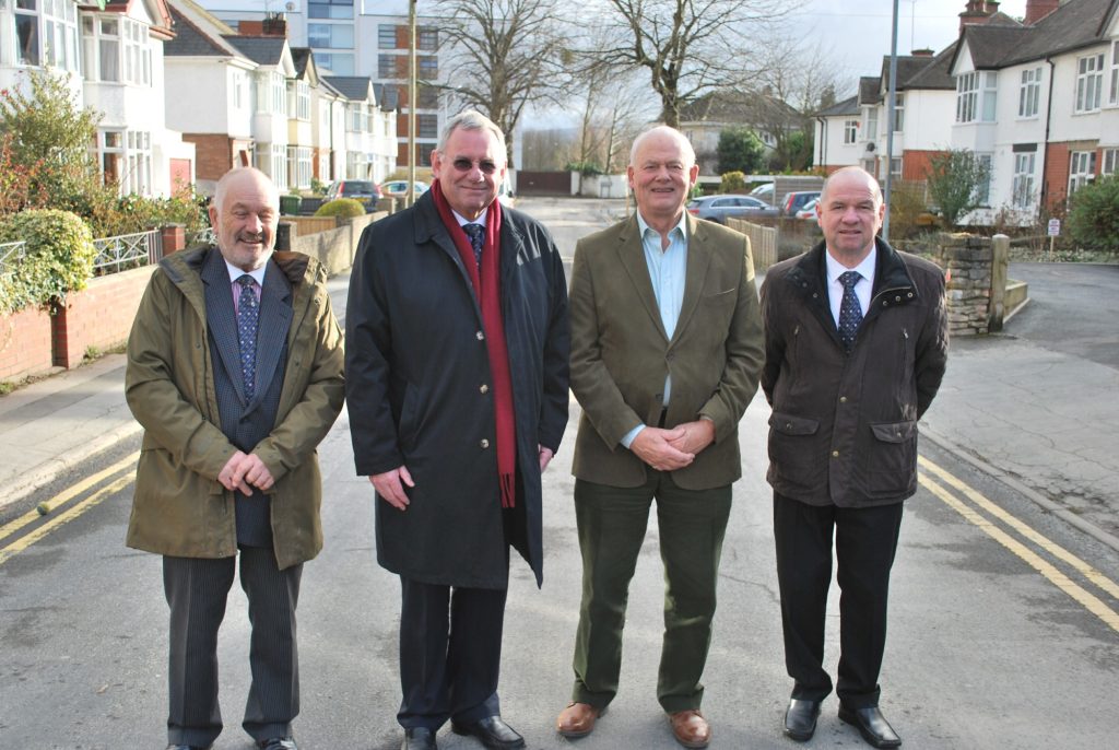 Provincial Charity Steward Nick Swan, Provincial Grand Master Michael Holland, Herefordshire Community Foundation Chairman Frank Myers and Provincial Almoner Malcolm Davies in Greyfriars Avenue, which was badly affected by the floods